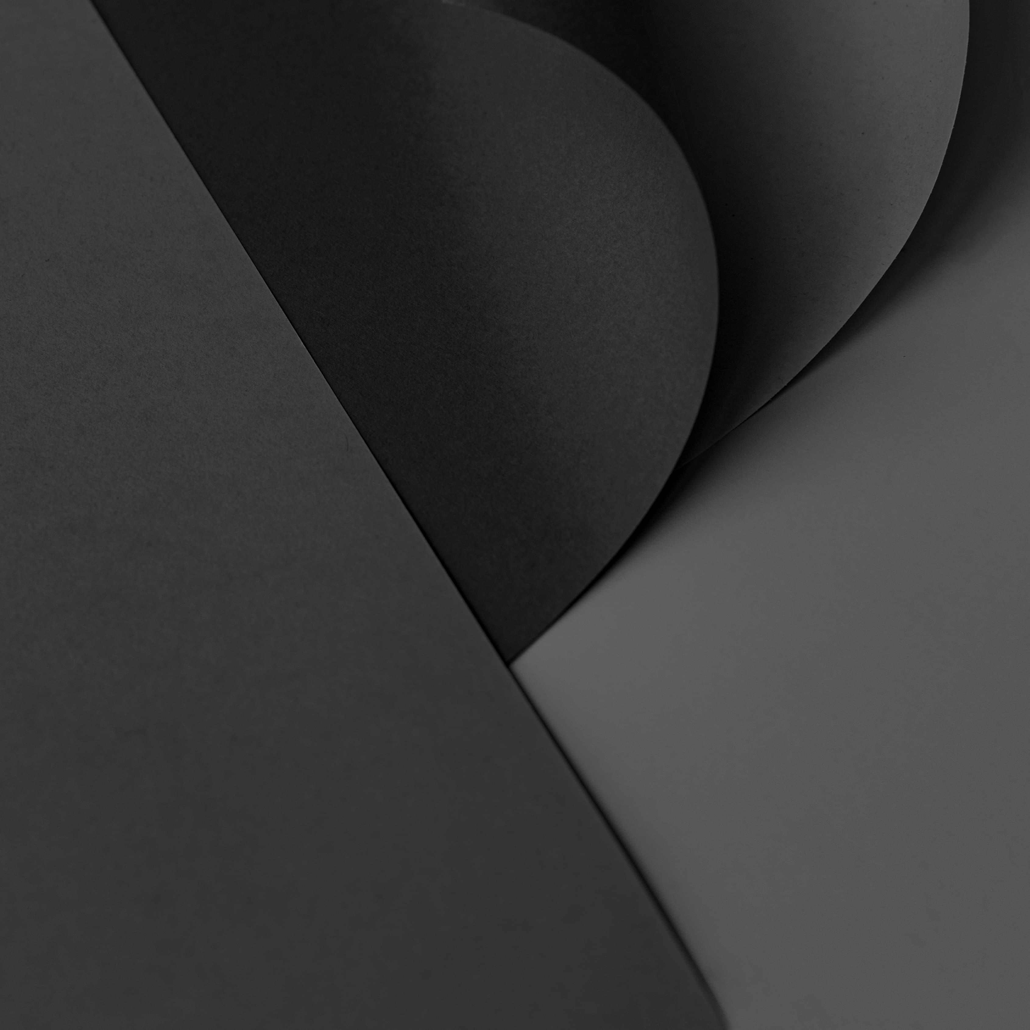 Curled dark paper geometry